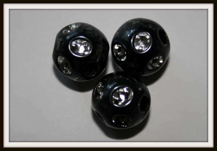 Perle ronde noire motif argent