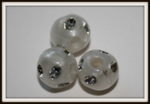 Perle ronde blanc motif argent