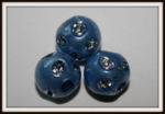 Perle ronde bleu foncé motif argent