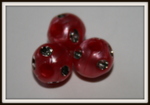 Perle ronde rose foncé motif argent