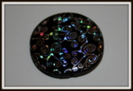 Perle ronde/plate noire motif argenté